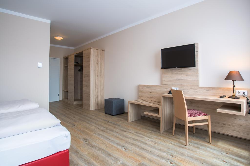 Aparthotel Altomuenster - Garni Bilik gambar